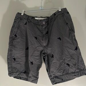 Men shorts size 33, color grey with birds all over shorts. Gently worn.